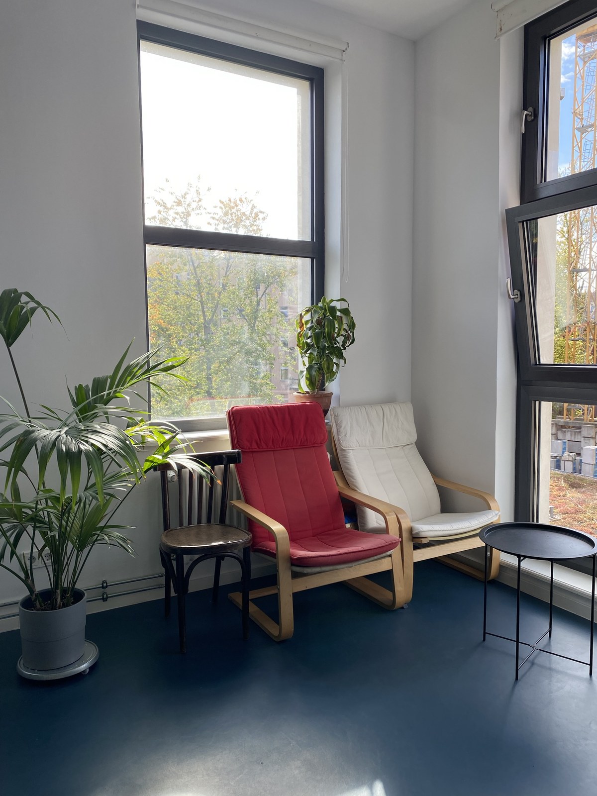 Seating corner by the window with plants