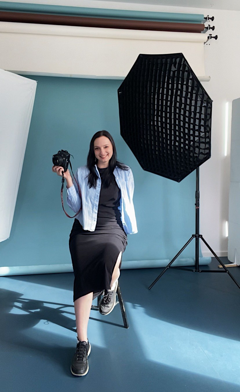 Viktoria Tistruha with her camera in the studio